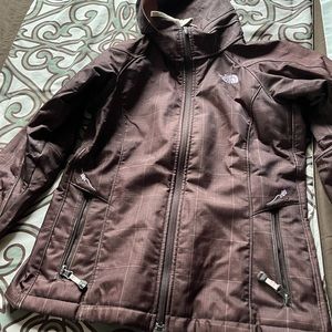 Women’s northface jacket size medium brown/burgundy coloured.